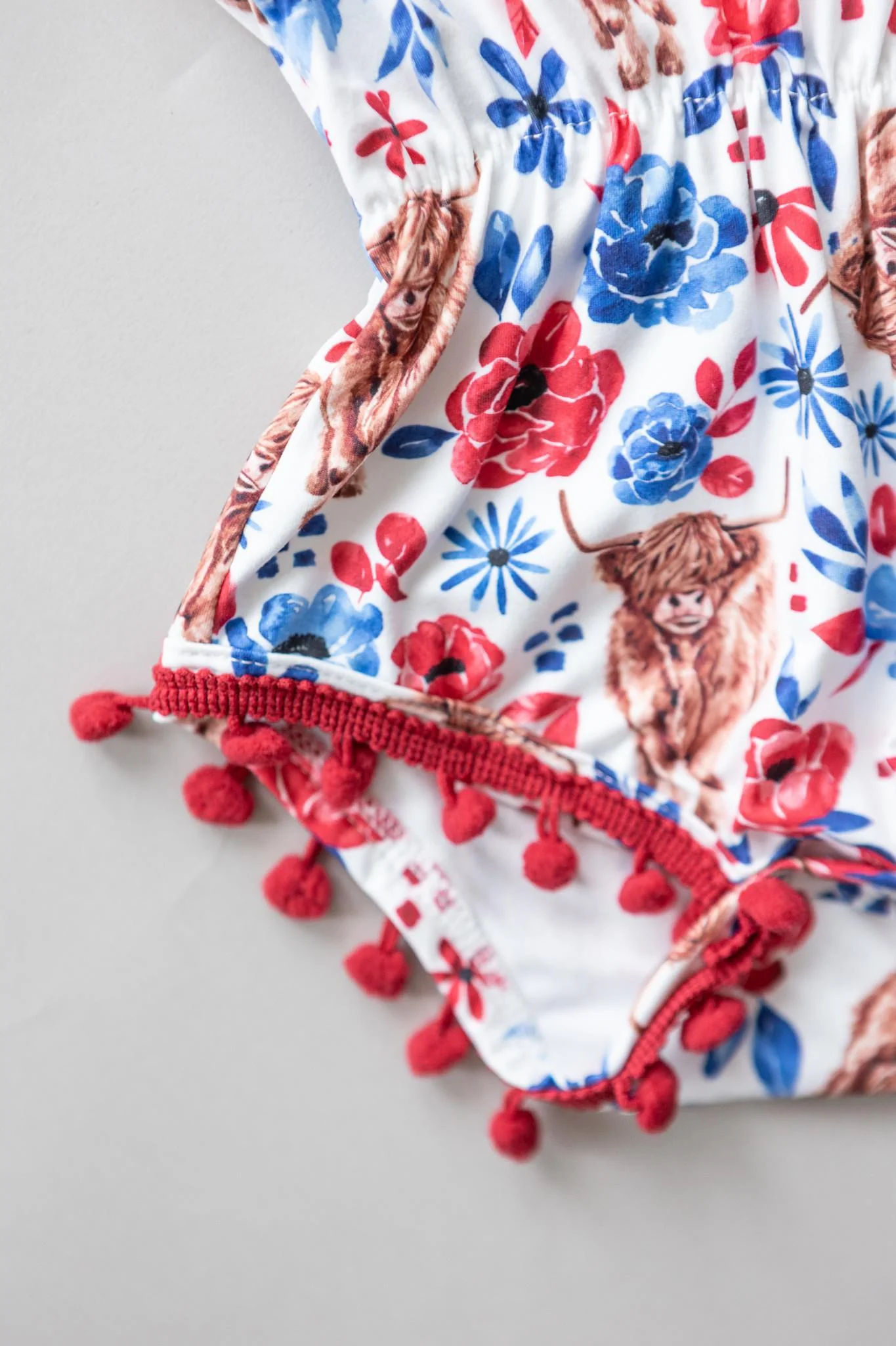 Highland Pom Pom Romper